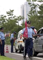 Police stop cars near site of G-8 foreign ministers' meet
